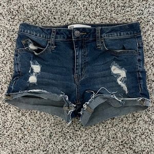 Blue ripped jean shorts